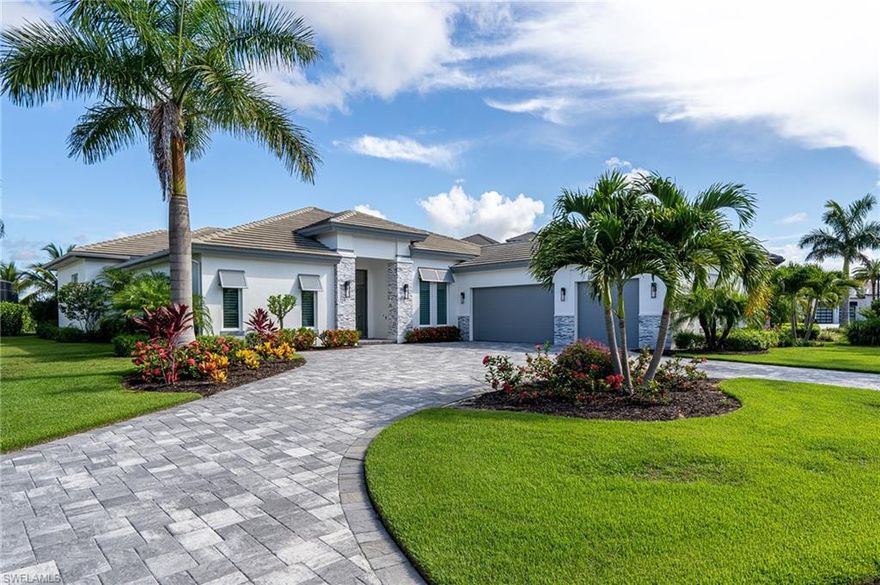 Presenting a rare, single-story, beachfront, contemporary home, offered in the highly desired Cortona enclave at Miromar Lakes. Completed in 2019, this custom built DIVCO home features 3,227 sq. ft. under air with large open spaces for gathering, 3 en-suite bedrooms, 5 bathrooms (3 full and 2 half), plus den, pool, a 3-car garage with built-in storage, circular driveway, beach and a shared boat dock. An expansive screened-in outdoor space offers a sitting area with gas fireplace, pool bath, kitchen, saltwater pool, spa and sun shelf. Inside, a chef’s dream kitchen with Wolf & Liebherr appliances, natural gas, marble countertops with a waterfall-edge center island and cabinets designed to hide and operate small appliances. Directly off the kitchen is a butler’s pantry equipped with a dry bar, refrigerated beverage drawers, wine cooler and walk-in pantry. Sprawling detailed ceilings range from 10'-13’ throughout and 10’ pocketing sliding glass doors in the great room. Automated conveniences include A/C, pool, garage doors, blinds and surveillance. Lawn maintenance, irrigation, basic cable, high-speed wireless internet, 24/7 home monitoring and Concierge Services are included.