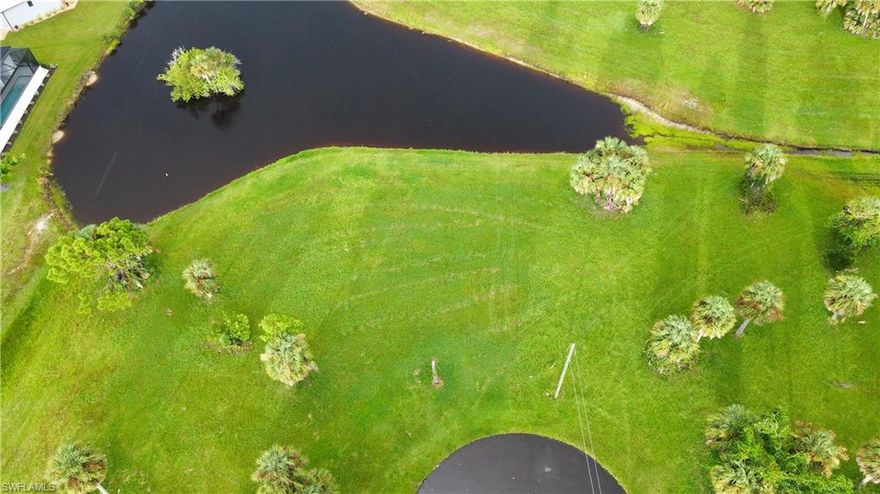 Build your dream home on this cleared lakefront lot with 140 feet of water frontage, located at the end of a private cul-de-sac in the desirable Burnt Store Lakes community. Enjoy breathtaking sunrises, Florida wildlife, and a peaceful setting surrounded by new custom homes. Community amenities include a kayak launch, park, and pavilion for neighborhood gatherings. With public utilities on-site, this property is ready to build.

For added value, the lot also offers the option to purchase a custom 4-bedroom, 3-bath home project, with city-approved plans and permits, for only $22,000 more — bringing the total purchase price to $68,200.