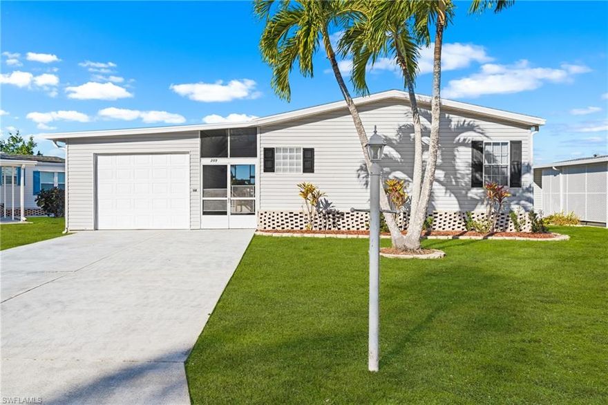 This flawlessly maintained home  offers a peaceful lakefront retreat in the highly sought-after 55+ Riverwood Estates community. Featuring three bedrooms, two bathrooms, and a spacious screened lanai, this home blends comfort, style, and serene waterfront living.Enjoy expansive lake views from the screened lanai, where tranquil water vistas and colorful sunsets set the tone for relaxed living
An inviting open floor plan creates the perfect setting for both everyday living and entertaining. The home offers expansive living spaces filled with natural light and designed for comfort and flexibility.
The primary suite serves as a private sanctuary, complete with a large walk-in closet, dual vanities, a luxurious soaking tub, and a separate shower. Step outside to the screened patio and enjoy breathtaking lake views, tranquil water sounds, and stunning sunsets.

Additional highlights include an attached 14' x 21' garage with plenty of room for a vehicle, a convenient workbench, and a loft for extra storage. This exceptional lakefront home offers relaxed, low-maintenance living in a vibrant and welcoming community.