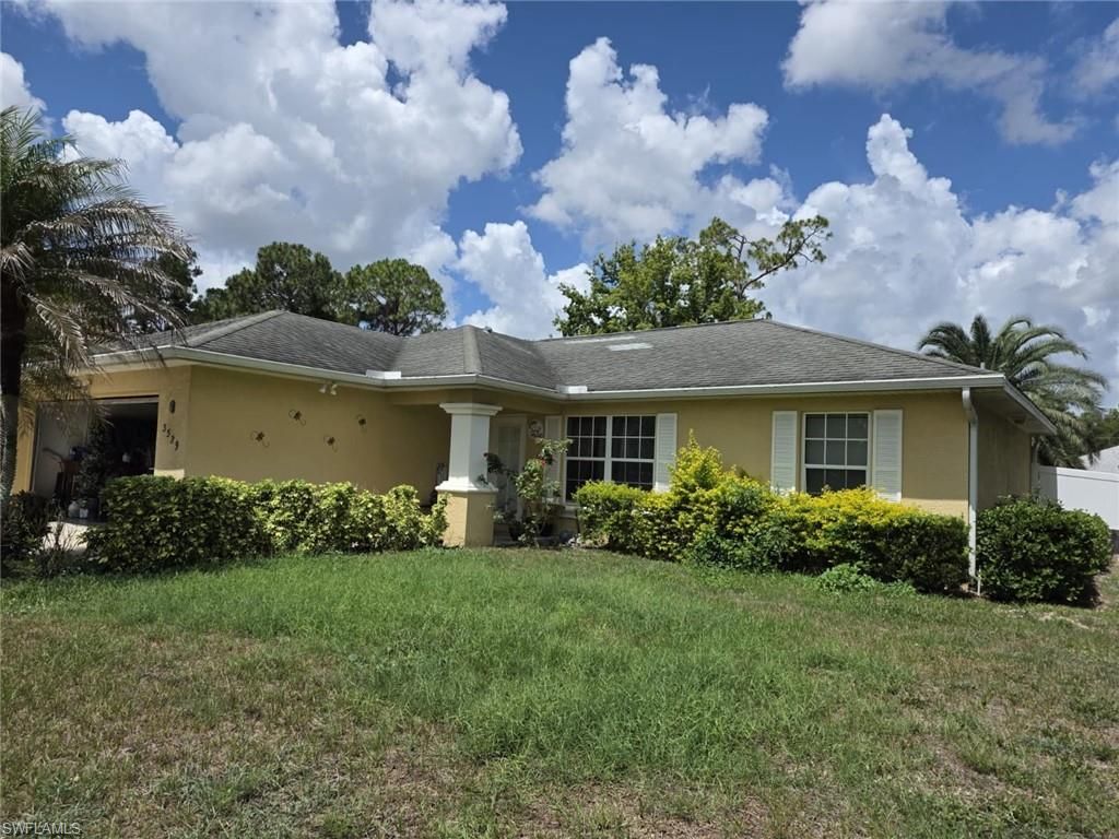 Photo of 3529 Sunshine BLVD, LEHIGH ACRES, FL 33971 (MLS # 226021043)