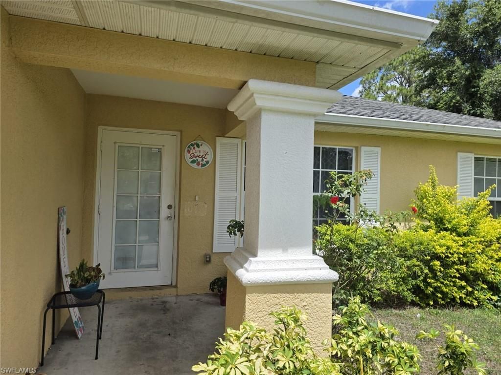 Photo of 3529 Sunshine BLVD, LEHIGH ACRES, FL 33971 (MLS # 226021043)