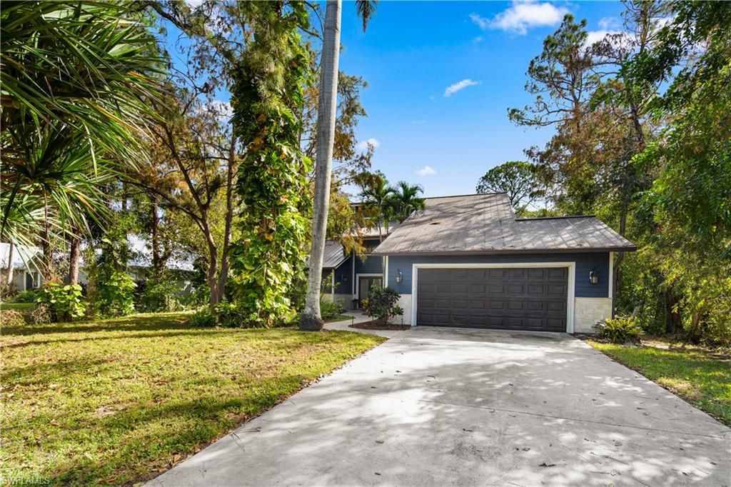 Photo of 5900 Cypress Hollow WAY, NAPLES, FL 34109 (MLS # 225083898)