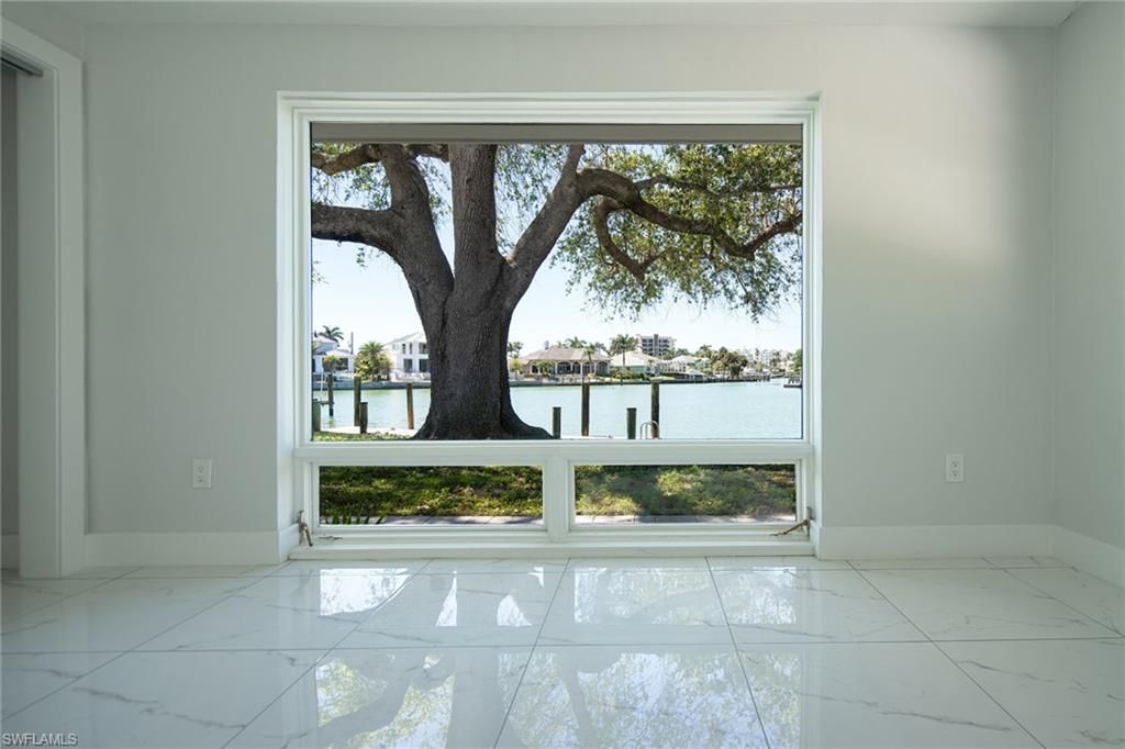 Photo of 320 Bow Line DR, NAPLES, FL 34103 (MLS # 225074828)