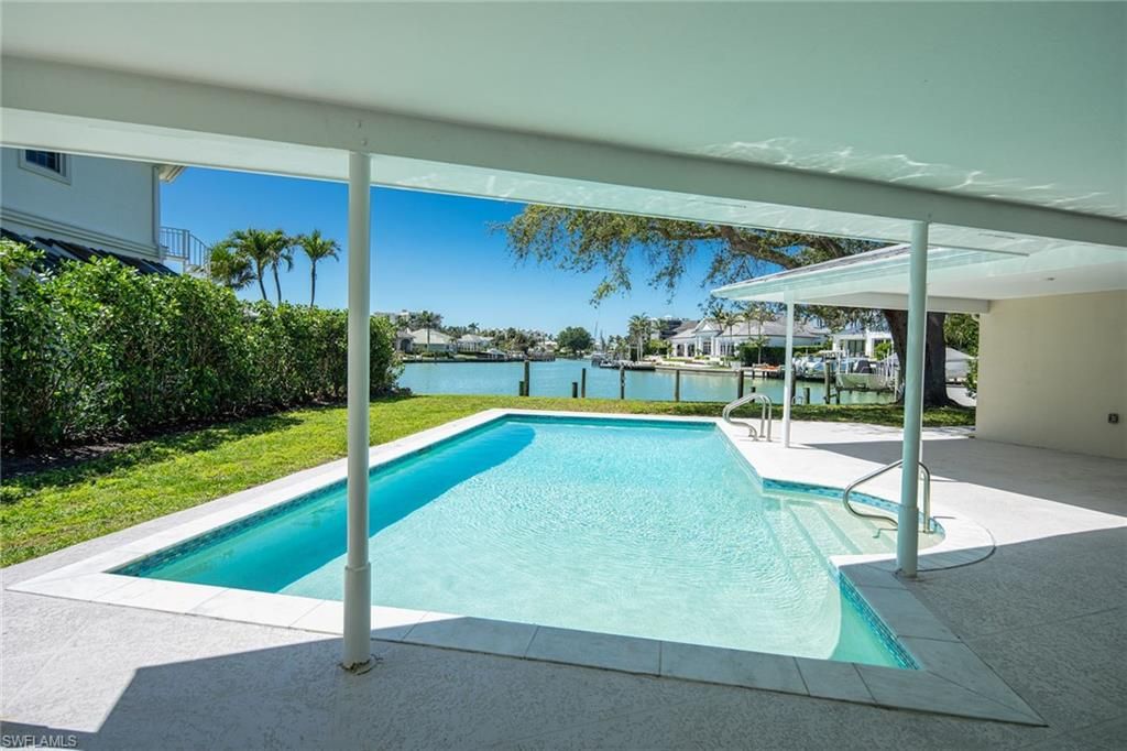 Photo of 320 Bow Line DR, NAPLES, FL 34103 (MLS # 225074828)