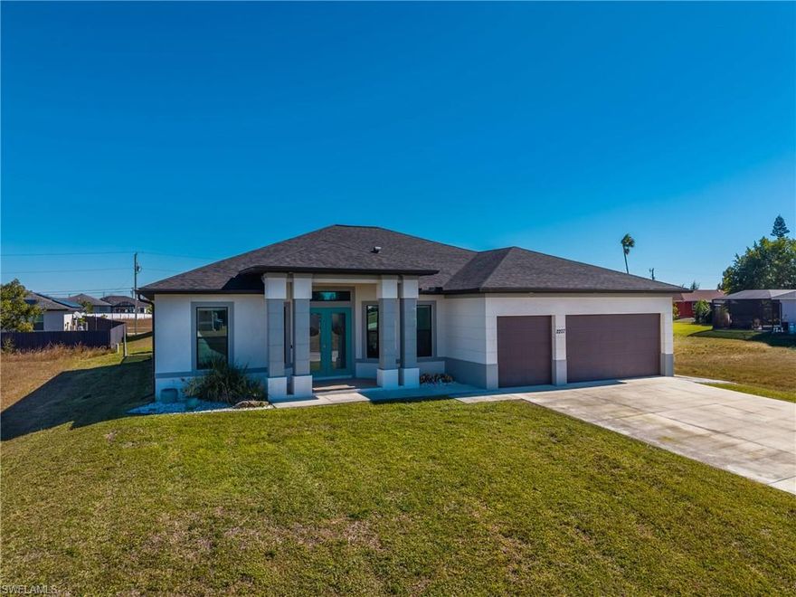 Welcome to this custom-built home located at 2207 NW 18th Avenue in Cape Coral, offering the perfect blend of quality construction, thoughtful upgrades, and exceptional outdoor living — all NOT located in a flood zone. Built in 2017, this spacious residence features 3 bedrooms plus a den, 3 full bathrooms, and over 2,100 square feet of living space, along with a 3-car garage. A new roof installed in 2023 provides added peace of mind and long-term value. The interior showcases high ceilings, upgraded tray ceilings, and 8-foot interior doors, creating a bright, open, and elegant living environment. The well-designed split floor plan includes a junior suite with a dedicated pool bath, ideal for guests, multigenerational living, or added privacy. This home is equipped with hurricane impact doors and windows throughout, offering enhanced safety, energy efficiency, and storm protection. A full-house reverse osmosis (RO) water system delivers clean, high-quality water to the entire home. Step outside to your private backyard oasis featuring a large swimming pool, expansive paver pool deck, and a covered under-truss lanai, perfect for year-round enjoyment. The fully equipped outdoor kitchen makes this home an entertainer’s dream, ideal for hosting family and friends or relaxing in true Southwest Florida style. Conveniently located in NW Cape Coral, this move-in-ready home offers comfort, upgrades, and long-term value for full-time residents, seasonal buyers, or investors alike. Schedule your private showing today and experience everything this exceptional property has to offer.