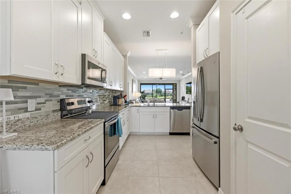 Photo of 9440 Benvenuto CT #3-104, NAPLES, FL 34119 (MLS # 226015099)