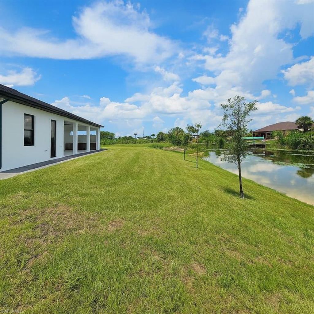 Photo of 1321 NE 19th TER, CAPE CORAL, FL 33909 (MLS # 226014602)