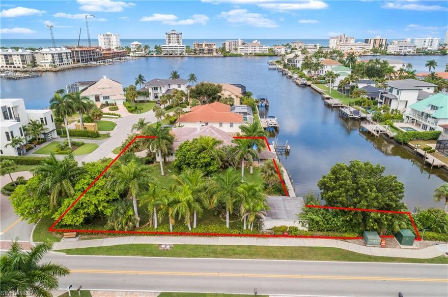 Don’t miss out on this incredible opportunity to build your dream home in the highly sought after Conners community on this premier, corner double lot on the canal. This exclusive property boasts 200 feet of water frontage (130 north facing & 70 west facing) providing the perfect opportunity to indulge in the best of both worlds - the wide canal allows you to enjoy the boating lifestyle with a short ride to Wiggins Pass and out to the Gulf. The premier location of Palm Court is also a short walk to Vanderbilt Beach where you can enjoy the incredible sunsets every night! This popular location allows you to walk the beach and visit some of the local favorites – Turtle Club, Buzz’s, Ritz Carlton and La Playa to mention a few. The large 21,303 sf lot provides the potential to build the home of your dreams or a wonderful estate with guest quarters. The oversized lot was once two individual lots that can be split again if desired. Contact the county for details. Seller can provide remodel or building plans if desired.