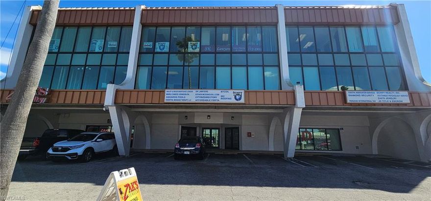 Prime Downtown Office Space – High Visibility Location! Located in the heart of downtown Cape Coral on busy Cape Coral Parkway with approximately 40,000–50,000 cars passing daily, this professional office suite offers outstanding exposure and convenience for your business.

This 800 sq. ft. professional office suite is located on the second floor of a well-maintained three-story office building. The property offers elevator access as well as two beautiful staircases leading to the second floor, giving clients and staff convenient options for reaching the office.

Customers can enter through the front entrance or rear parking area, both leading into a welcoming lobby with access to the elevator and staircases. Your office is conveniently located down the hall to the left on the second floor.

Inside the suite you will find:

• Private reception area when entering the office
• Main workspace area with storage
• Kitchenette area
• Two private offices
• Additional small flex room off one office
• Utility closet
• Private bathroom with sink and toilet
• Floor-to-ceiling windows in two offices, plus a large exterior hallway window providing excellent natural light

The space is move-in ready and ideal for professional services such as attorneys, doctors, insurance offices, consulting, medical administration, or similar uses.

Rent includes water, so tenants only need to cover electric and internet.

Ideal for attorneys, doctors, insurance agencies, consulting firms, and other professional services seeking a prestigious downtown business address.

Located directly across from Big John's Plaza and near the area where the city hosts its popular downtown art festivals, this location places your business in the center of one of Cape Coral’s busiest commercial corridors.

The building features hurricane-impact glass and a professional environment perfect for growing businesses.

Don’t miss this opportunity to secure a prime downtown office location.