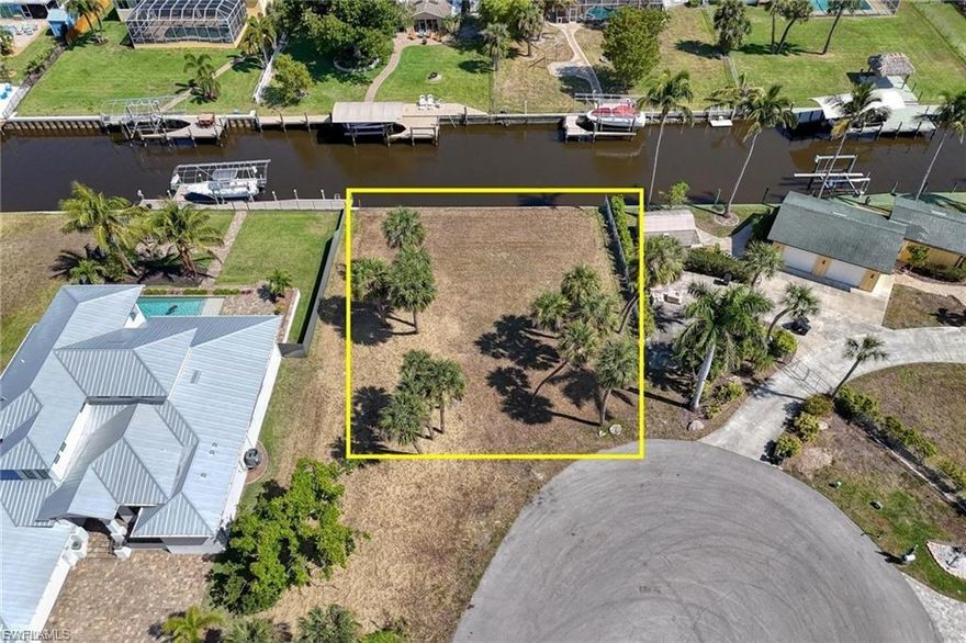 This exceptional lot offers one off the most desirable locations in the area. Discover the hidden gem of Fort Myers Gulf Acres, in a charming neighborhood, and free from Cape Coral's restrictions and city taxes. Nestled along the Caloosahatchee River, this spacious, private, and peaceful lot offers a direct Ocean access canal, Boasting a 90-foot seawall, it's ideal for docking your boat and enjoy many water activities. 
Imagine your dream retreat surrounded by natural beauty, where every sunrise reflects over the water and every evening feels like a gateway. Whether you're looking to build a vacation home, an investment property, or your forever escape, this lot is what you are looking for. Price below comparable lakefront lots, it represents outstanding value for those seeking beauty and opportunity. 
Exciting local developments include Paradise Isle, a forthcoming mixed-use resort featuring a luxury hotel, marina, dry boat storage, golf course, riverfront boardwalk, and walking paths. Surrounded by executive homes, this lot is a prime investment opportunity. Don't miss this rare and opportunity to own a piece of paradise!