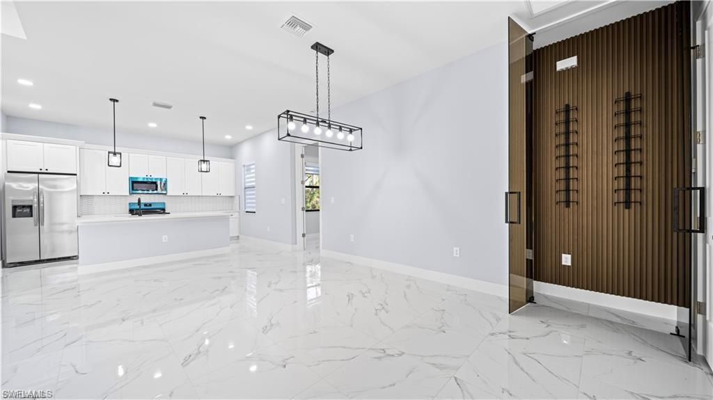 Photo of 1210 CLAYTON AVE, LEHIGH ACRES, FL 33972 (MLS # 225083389)