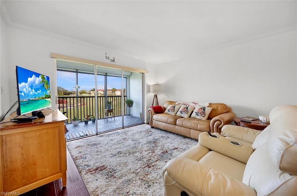 Photo of 49 High Point CIR S #208, NAPLES, FL 34103 (MLS # 226005418)