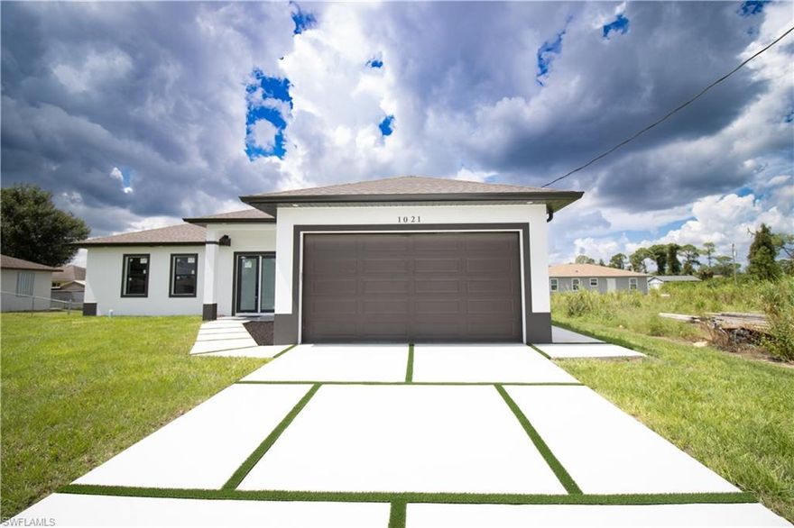 Welcome to your stunning new construction home in the heart of Lehigh Acres! This spacious residence offers three bedrooms, a versatile den, elegant marble floors, and modern kitchen appliances. With a 2-car garage and a prime location near Lehigh Senior High School, Varsity Lakes Middle School, and Tortuga Elementary School, this home provides convenience for families. Situated right off Lee Blvd and Bunkingham Ave, it offers easy access to shopping, dining, parks, and more. Don't miss the chance to own this luxurious and well-located home in a vibrant community!