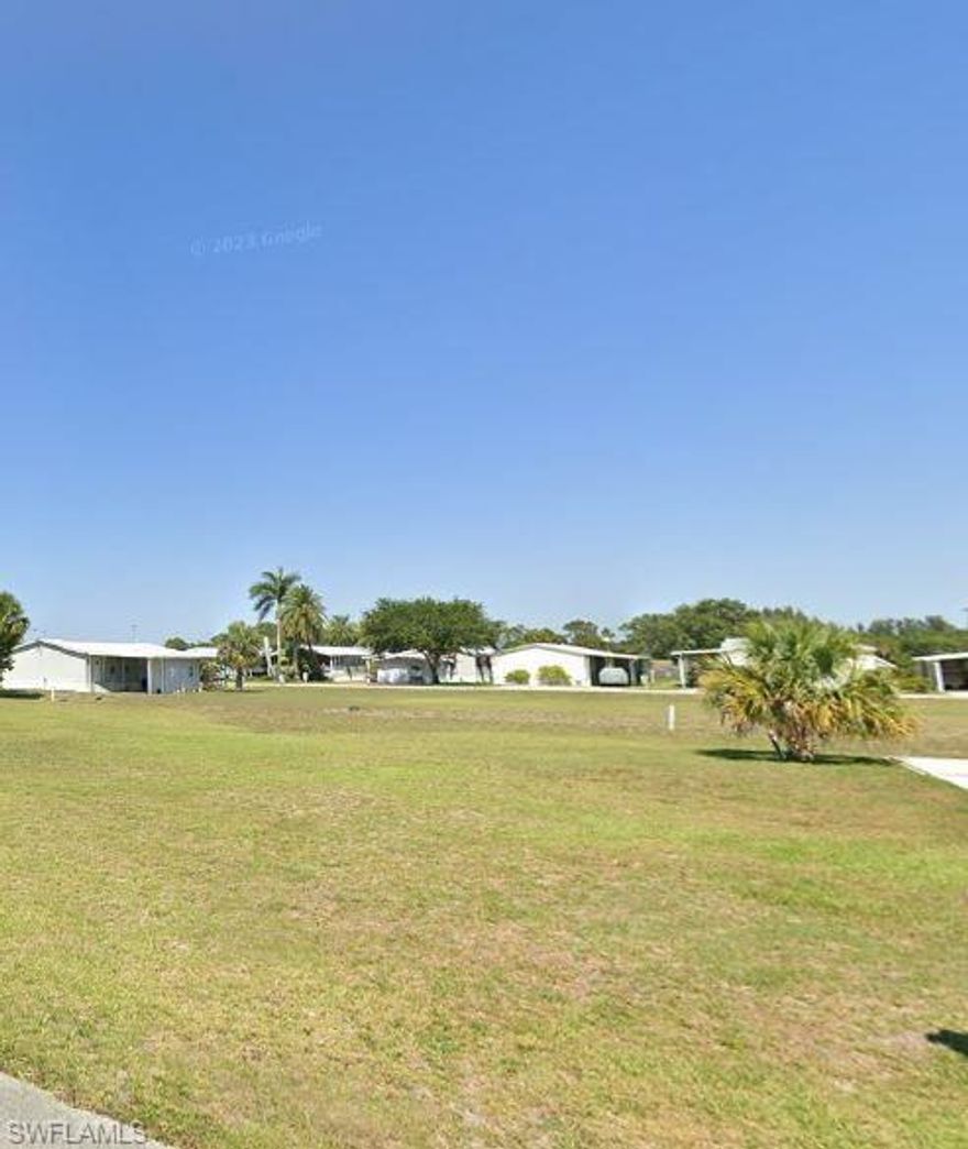 This is wonderful opportunity to own a .125-acre vacant lot in Moore Haven Yacht Club, a 55+ Residential Manufactured Home Community. This community offers the unique advantage of owning your lot with City Water and Sewer connections. This provides a serene and welcoming environment for its residents. 
As a member of the Homeowners Association, you will have access to a range of amenities, including the use of the Clubhouse Facilities, Swimming Pool, planned Activities, and lawn mowing service. 
Don't miss out on this opportunity to become a part of this vibrant and active community.
