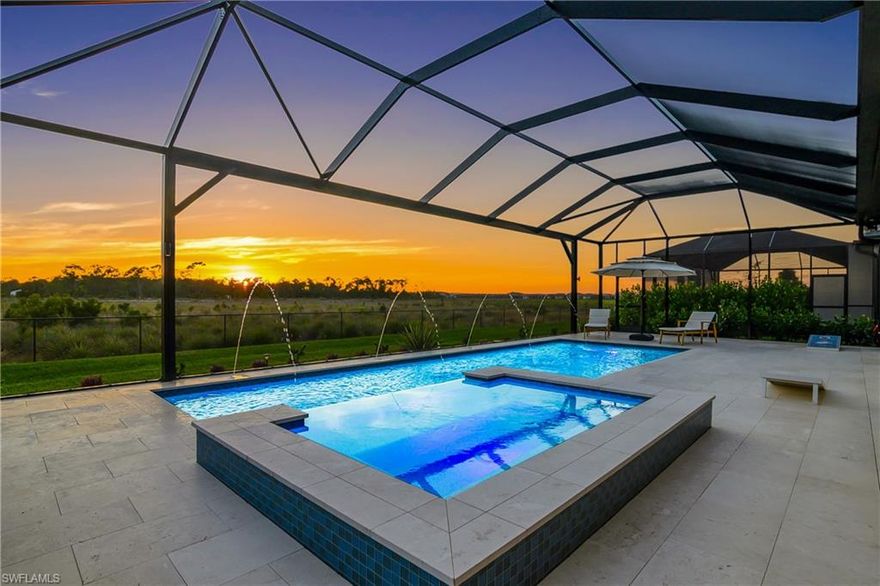 Perfectly positioned on a premium preserve lot, this highly customized home captures peaceful and private views of natural Florida landscape where deer and a variety of birds can often be seen. The outdoor living space is a true highlight, featuring a custom pool with an oversized hot tub, all enclosed within an expansive panoramic screen cage. The large lanai is finished with marble tile flooring, includes a dedicated pool bath, and is already plumbed for an outdoor kitchen, creating an ideal setting for entertaining or unwinding in total privacy.

Inside, the home offers 3 bedrooms plus a den, 3 full bathrooms, and 2 half bathrooms, along with a spacious 3 car garage. Thoughtful design details are evident throughout, including tray ceilings in the main living areas, primary suite, and office, as well as a dramatic zero corner sliding glass door that seamlessly blends indoor and outdoor living. Plantation shutters, custom closets, and hurricane impact glass windows and doors add both style and peace of mind.

The kitchen is beautifully appointed with upgraded cabinetry, quartz countertops, under cabinet lighting, a stylish backsplash, and a premium KitchenAid appliance package. Bathrooms are equally refined with shower tile extended to the ceilings. Additional upgrades include a smart home package with Nest doorbell and thermostat, whole house water filtration and softener system, tankless water heater, and both gas and electric utilities.

The exterior impresses with stone masonry accents, a distinctive bay window design that extends the 2nd bedroom with an additional 36sqft of space, and lush palm trees that enhance curb appeal. The garage is fully outfitted with epoxy flooring, insulated doors and ceiling, while the upgraded laundry room features LG appliances and additional cabinetry for convenience.

Set within the resort style gated community of Verdana Village, residents enjoy an unmatched amenity experience centered around the expansive clubhouse featuring a full indoor sports complex with basketball, volleyball, tennis and pickleball courts, a state of the art fitness center, movement studio, on site restaurant and café, and a resort style pool and spa. Outdoor amenities include additional tennis and pickleball courts, a playground, scenic walking paths, and beautifully maintained green spaces, all supported by a vibrant social calendar that creates an active and engaging lifestyle right at home.

This property offers a seamless combination of high end finishes, functional design, and a tranquil natural setting, all within one of Estero’s most desirable communities.