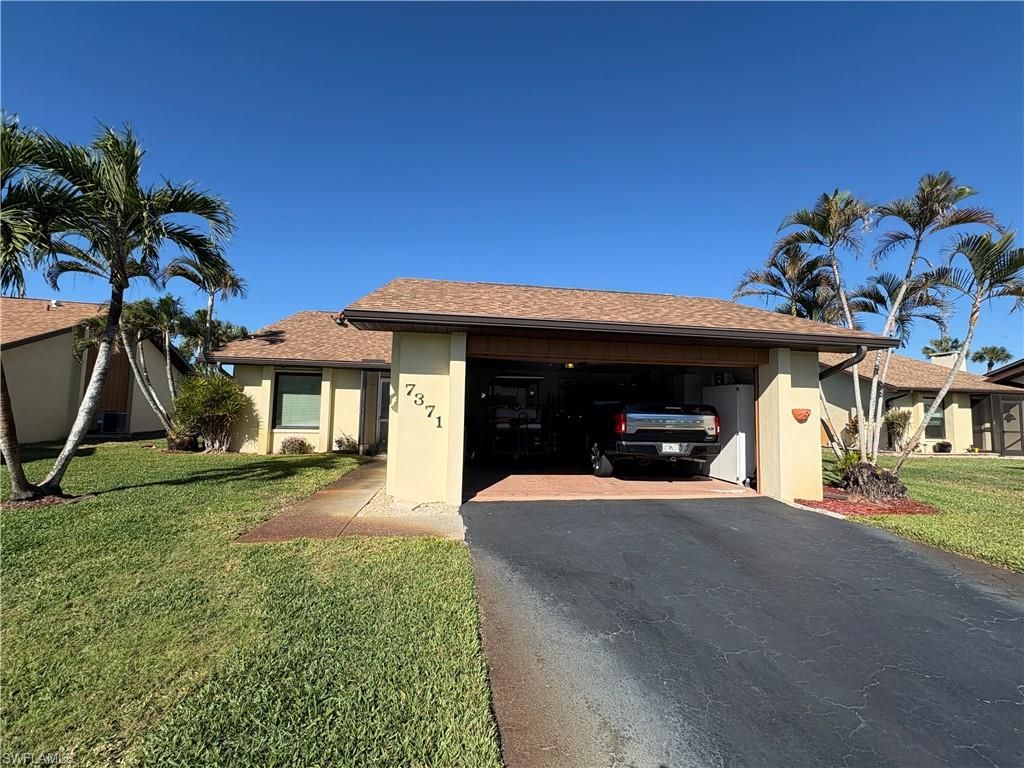 Photo of 7371 Golf Villa DR, FORT MYERS, FL 33967 (MLS # 225084081)