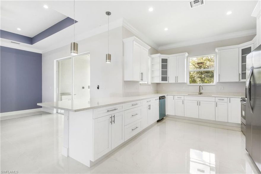 NEW CONSTRUCTION in Golden Gate Estates! Situated on 2.73 acres of land in a non-deeded Naples neighborhood, this single family home is perfect for a growing family. Built with integrity and featuring a great room & split bedroom layout, an open concept living floor plan, gorgeous contemporary designed kitchen w/ quartz countertops & stainless steel appliances, 20x20 flooring throughout, remote control ceiling fans, volume & tray ceilings, epoxy floor in garage, and an open rear lanai overlooking a huge backyard. The master suite has enough room for a full size master bedroom set and still have room for a sitting area, a 6x5 walk-in closet, and a beautiful master bath featuring a tiled shower w/ frameless glass enclosure and a dual sink vanity. This area of Golden Gate allows you to have an Old Florida feel on your property while still being just minutes from all the conveniences of life.