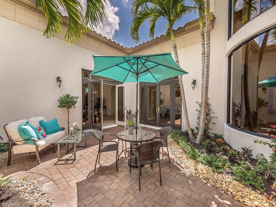 H.15660 - The sun filters through this bright and welcoming home featuring a Southern exposure in a private setting. As you enter the home, you are immediately drawn to the layered view through the intimate courtyard. Designed with the casual elegance of a traditional home feature fresh white cabinets in the kitchen and accents of blue and coral throughout. Work in your study as you peer into the courtyard, perfect for a quiet retreat. Step just outside to your built-in grill at the covered outdoor living area. Whether relaxing at the sun filled pool all day or unwinding at the spa in the evening, you'll appreciate the private setting. Two private guest suites and a great room that offers a large open gathering area for family and friends are only a few reasons to see this home! Elegance, privacy, and sophistication! Located in Mediterra, an award-winning private Club, you can enjoy eight miles of biking and walking trails weave through the community. With a commitment to excellence that has led to three Distinguished Emerald Club Awards, look to Mediterra when searching for a luxury community that is committed to exceptional service and member experience.