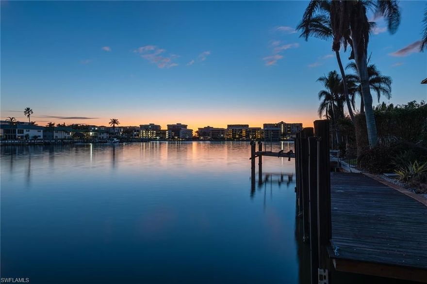 Enjoy coveted south-facing bay views from this beautiful waterfront homesite in the Moorings. Situated on one of the most desirable streets in the neighborhood, this .39-acre homesite presents the perfect opportunity to build your waterfront dream home. Bay Point is a small intimate street that is quiet and private, all while being within a ten-minute walk to the beach. Moorings residents enjoy private beach access at the Moorings Beach Park and are a short distance to Venetian Village, Waterside Shops, and the upcoming Naples Beach Club, a Four Seasons Resort. This property is being offered at lot value with no monetary value placed on the current dwelling.