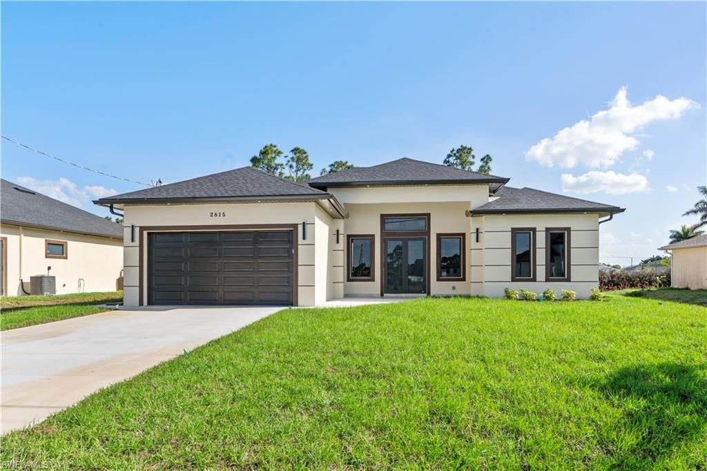Photo of 2815 19TH ST SW, LEHIGH ACRES, FL 33976 (MLS # 226013730)