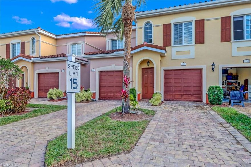 Located in one of Estero's most sought-after condo communities, this 3 + den home features the largest floor plan in this amenity-rich community.  With access to the community pool just steps away, this home boasts large bedrooms, an attached garage, and a private screened lanai with a garden view.  The den/flex room will give you plenty of space for an office or formal dining area.   Soaring high ceilings promote an airy feel, and the kitchen features beautiful granite countertops and stainless steel appliances.  Dual his & her closets in the master bedroom and en-suite bath with dual vanities and soaking tub with separate shower.  Hurricane impact-glass windows and sliders throughout.  Plenty of guest parking and community amenities include; a community town center, movie theater, full-menu café, ice-cream bar, fitness gym, multiple swimming pools, tennis/pickleball, grill patio, and clubroom.   HOA fee includes water, cable tv, and high-speed internet!  The community maintains a full social calendar with popular events.  Close to Gulf Coast Town Center, Miromar Outlets, Coconut Point shopping centers, and plenty of other shopping and restaurants. See this home today!