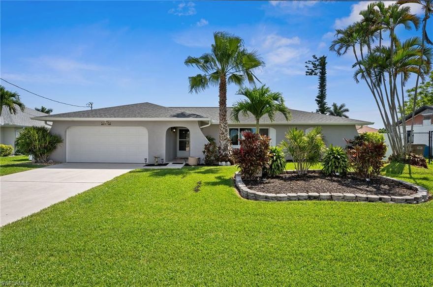 Wake up to breathtaking sunrises in this remarkable waterfront home located in the desirable Pelican neighborhood of Cape Coral. Situated on the renowned Lotus Canal with long eastern views down Princeton Canal, this gem is positioned right at the intersection, offering unparalleled water vistas.

Featuring three bedrooms and two full bathrooms. This home provides ample room for comfortable living. Step outside and embrace outdoor living at its finest with hurricane shutters and shades for added security, an extended paver patio, and a large covered area in the lanai. The new "picture window" pool screen cage ensures an unobstructed view down the canal, while the inviting pool beckons for a refreshing dip.

Inside, the home has a newer kitchen equipped with stainless steel appliances and elegant granite countertops. There is travertine flooring in the living area and upgrades throughout the home. The bathrooms have been tastefully updated, with the master bath featuring a glass-walled shower, dual sinks, and a separate soaking tub for ultimate relaxation.

This home offers the convenience of a composite dock with a boat lift, providing easy Gulf Access for delightful boat rides to beaches, restaurants, and the Gulf of Mexico.

Living in this waterfront sanctuary means you'll have access to all the fun activities Cape Coral has to offer. Whether it's boating along the Gulf Access canal or exploring nearby parks and nature reserves, there's something for everyone to enjoy.

Don't miss out on the opportunity to own this exceptional waterfront retreat in the sought-after Pelican neighborhood. Schedule a tour today and experience the luxury of waterfront living for yourself!