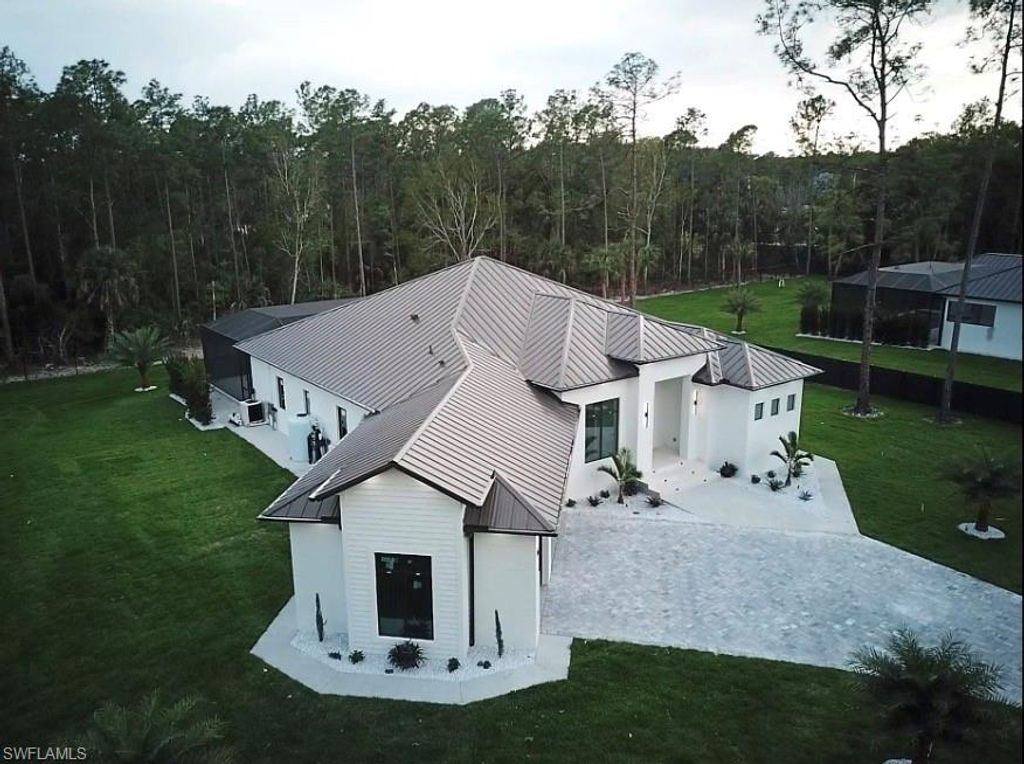 Photo of 3414 1st AVE NW, OTHER, FL 34120 (MLS # 226012915)