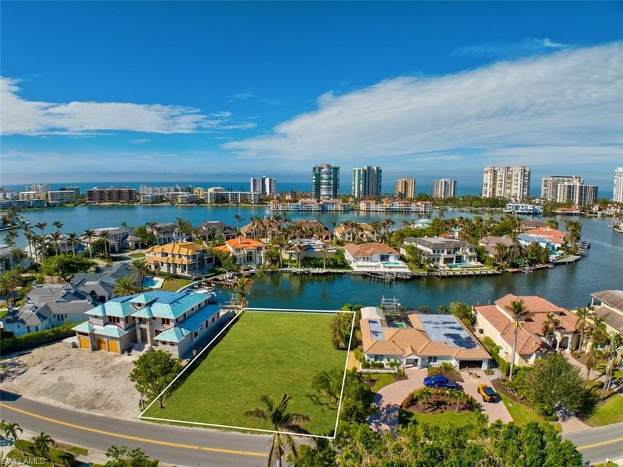 Premium Park Shore Western exposure location, boasting direct western water views from this custom homesite. This is a boaters dream lot. Quickly access Venetian Bay, head South through Moorings Bay, and then access the Gulf of Mexico via Doctors Pass. Your new masterpiece will be in good company on this highly desirable & scarce parcel. Fine dining, shopping, and conveniences abound nearby to this demand location. Fifth Ave South, Third St South, Venetian Village and Waterside Shops are all within a few miles of, what could be your brand new dream home! Residents may also enjoy the availability of voluntary membership to the popular and private Park Shore Beach Park.