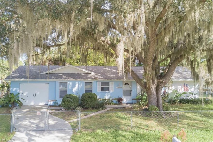 Listing is pending having trouble changing the status in MLS.  PRICE REDUCED!!! NO FLOODING EVER!!!  Welcome to this well maintained home in Fort Myers, conveniently located with access to all of SW Florida area via Hwy 31, Hwy 80 and I-75.  Completely fenced lake front property with mature shade trees.  Hurricane shutters for all openings except the emergency exit. 
This 2 bedroom, 2 bath home is in a split layout with a master plus bath on the east side and the second bedroom on the west side adjacent to the guest bath.  The master bath shower has recently been upgraded with new tile and new fixtures. The screened lanai lies off of the rear thru 6 ft slider doors. The kitchen with pantry has a new SS large refrigerator with ice maker. Now on Supra on front door.