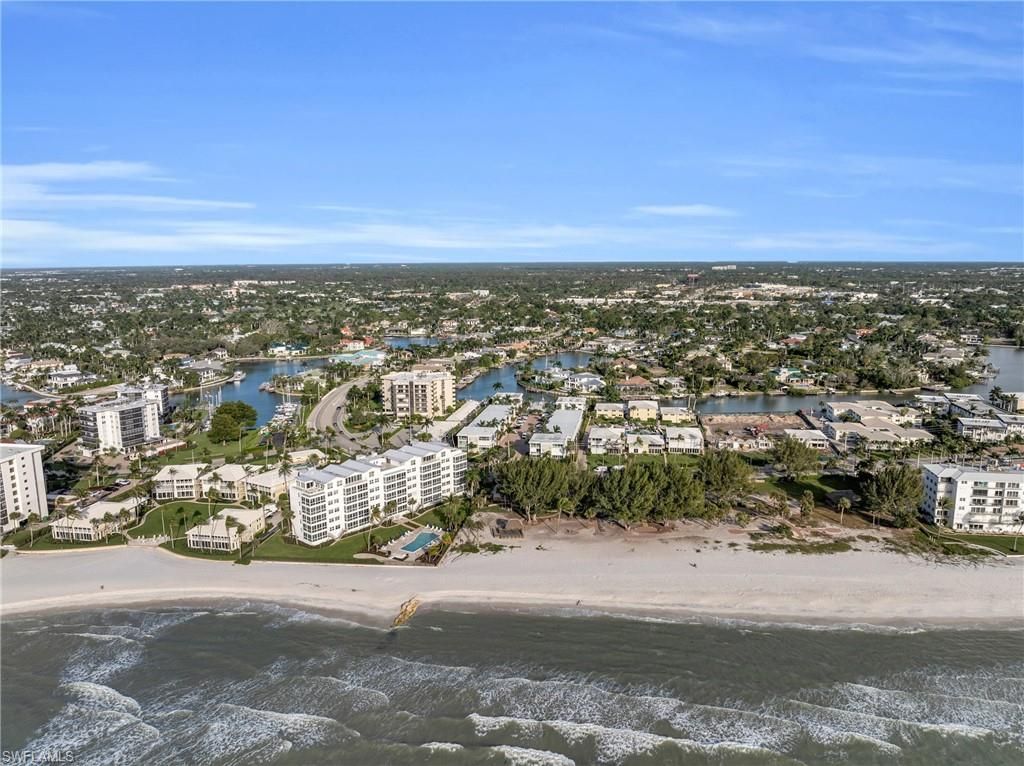 Photo of 2100 Gulf Shore BLVD N #206, NAPLES, FL 34102 (MLS # 225081437)