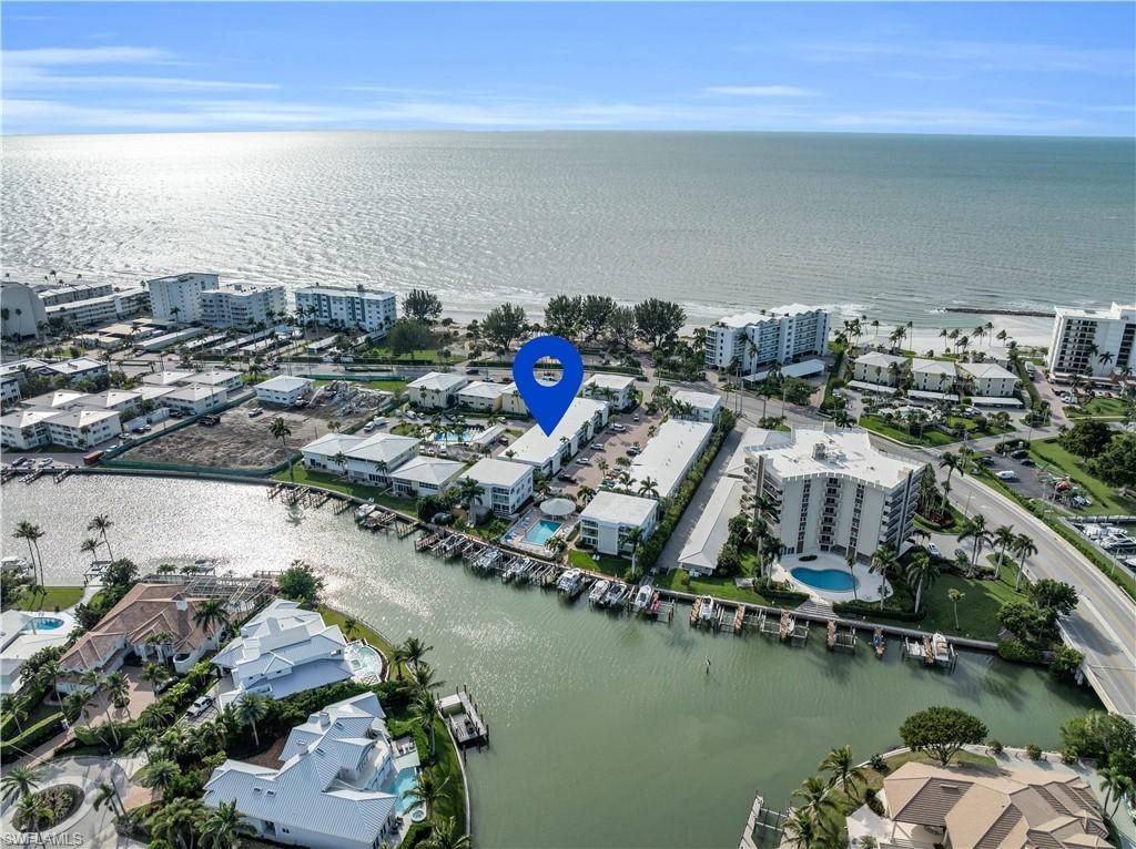 Photo of 2100 Gulf Shore BLVD N #206, NAPLES, FL 34102 (MLS # 225081437)