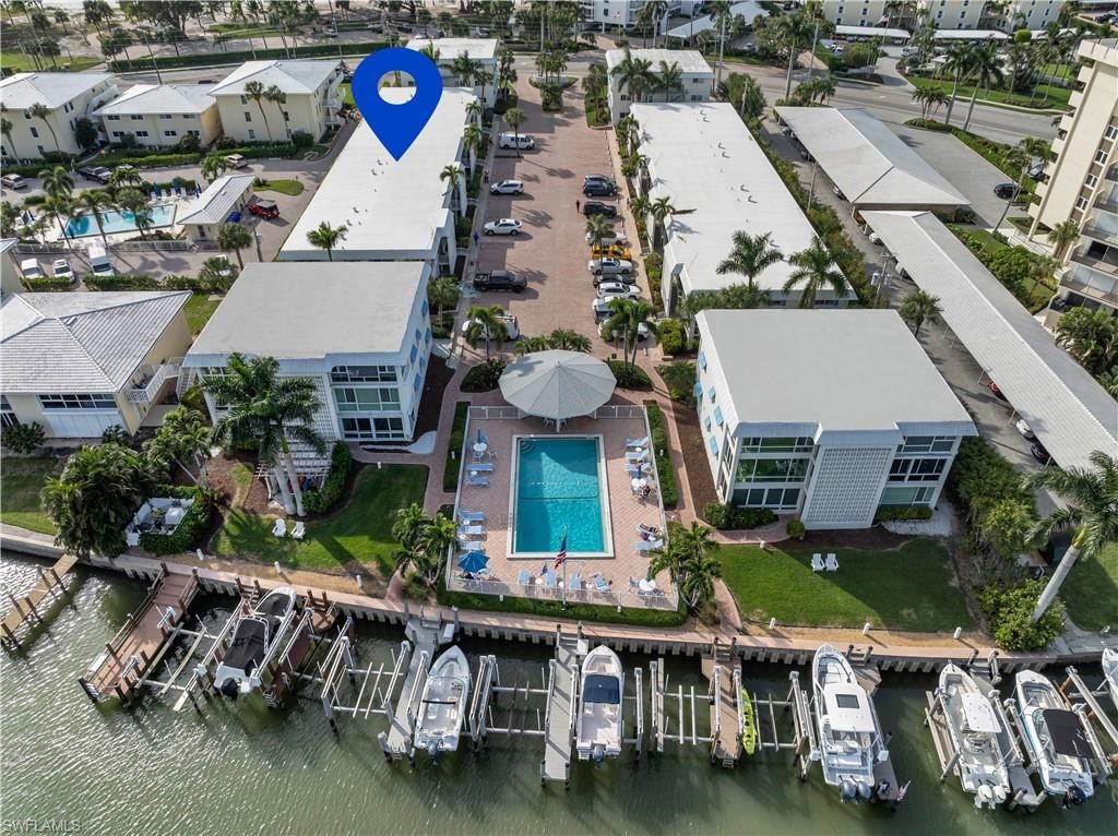 Photo of 2100 Gulf Shore BLVD N #206, NAPLES, FL 34102 (MLS # 225081437)