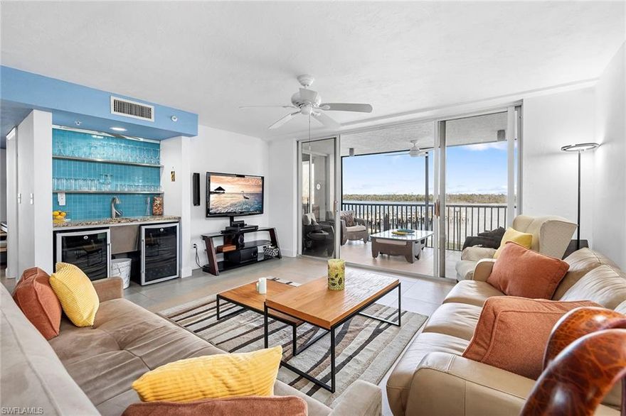 Wake up to breathtaking bay views and savor your morning coffee on a private lanai, accompanied by soothing sounds of dolphins playing just beyond your view. This beautifully renovated waterfront residence offers an exceptional coastal lifestyle, blending contemporary design with effortless indoor-outdoor living. The modern kitchen is thoughtfully designed to flow seamlessly to both expansive balconies, creating a setting for entertaining or relaxed everyday living. The primary suite is a private retreat, featuring dual oversized closets, a spacious, fully remodeled spa-inspired bath and direct access to the lanai. Designed with entertaining in mind, the residence includes a stylish wet bar complete with dual wine refrigerators, ensuring you are always ready to host with ease. A flexible room adjacent to the second balcony is equipped with a custom Murphy bed, offering elegant accommodations for guests or a versatile space for a home office. The second en-suite bedroom is generously sized, features a remodeled bath and enjoys private balcony access, providing comfort and privacy for family or visitors. Experience the ultimate in waterfront and coastal living so schedule your private showing today.