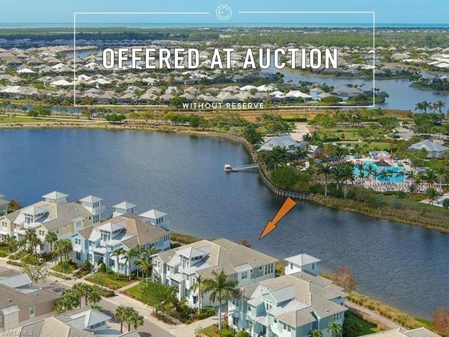 LUXURY REAL ESTATE AUCTION on-site on Sunday, February 15, 2026, at 2:00 PM. Previews begin on Sunday, January 25th, and will run every Sunday from 1:00 to 4:00 PM until the auction. 
Highly desired Hibiscus Retreat floor plan! This Coach home, in a gated community, is waterfront and located only 90 feet from the Cypress River Waterway’s widest point (ocean water) that offers spectacular, unobstructed views from kitchen, great room, sunroom, and side balcony. Enjoy views of daily sunsets, two boat docks, club house, pool, and numerous wildlife. Cypress River has access to the Gulf of Mexico. Coach homes are built to strict high-quality commercial standards and is fully sprinklered and NOT IN A FLOOD ZONE (Low home insurance, the seller currently is paying $678 a year for HO6 home insurance). This popular 2,781, sq. ft. Hibiscus Retreat coach home floor plan is rarely available. It has 3 bedrooms, 3 baths, den/office, sunroom, loft retreat, covered front porch and two outside balconies. You have your own PRIVATE ELEVATOR that services the entry level, main floor, and loft on the third level. Coach home features include impact glass, vaulted ceilings, crown moldings, plantation shutters, beautiful hardwood flooring throughout (except for tile bathrooms), quartz countertops, walk-in closets in master suite, custom closets in other 2 bedrooms, large 2 car garage with an array of built-in storage cabinets and three ceiling bike racks. New HVAC installed 5/6/22. The Isles of Collier Preserve is a gated community which is only a 10-15 minute drive to Old Naples, 5th Ave restaurants, shopping, art galleries and pristine white sand beaches. First-class amenities include: resort style pool, spa, separate lap pool, club house, state-of-the-art fitness center, locker rooms, saunas, tennis, pickle-ball, bocce, miles of walking/biking paths, pool-side restaurant, kayaking, canoeing, paddle boarding, and dog park all in an environment with more than half of The Isles being a natural preserve.