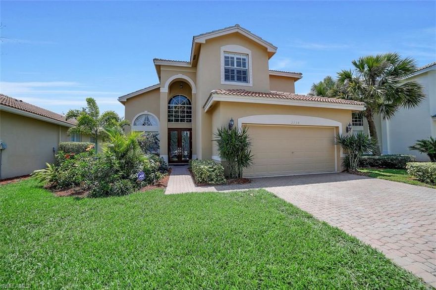 WOW FACTOR! This popular "Ibis" is situated on a desired lake front lot with Southern Exposure, giving this home a bright and airy feeling. From the moment you walk in the door, you are greeted with 20' ceilings throughout the Great Room, Kitchen, and Eating Areas. The Kitchen offers Brand New Stainless Steel Appliances including French Door Refrigerator. The Kitchen is open to the Great Room with Sliders to the screened Lanai. The FIRST FLOOR MASTER SUITE features tile floors, custom wall finishes, and his & her closets. There is also a Den and Full bath on the ground floor. Upstairs, you will find a Loft w/ Storage Room, 2 additional bedrooms and bath. A long list of Fine Appointments include New AC Unit, New 20" diagonal tile floors, Freshly Painted Exterior, New Carpets, Plantation Shutters throughout, Crown Molding, Solid Wood Bannister, Tinted Windows, & more! Saturnia Lakes offers a resort pool, lap pool, kiddie pool, hot tub, fitness room, dance studio, internet cafe, saunas, massage rooms, billiards room, ballroom, 4 clay tennis courts, playground, basket ball court, & miles of walking paths. HOA fees include Landscaping, Irrigation, Amenities, Cable TV, Internet, Phone!