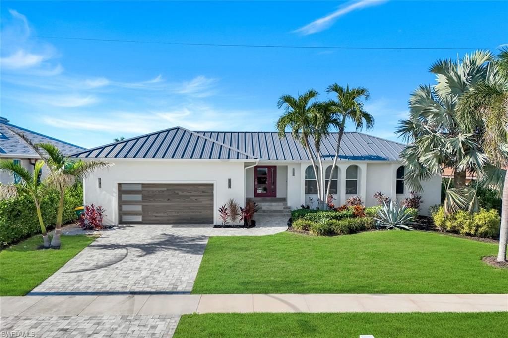 Photo of 819 Perrine CT, MARCO ISLAND, FL 34145 (MLS # 225084309)