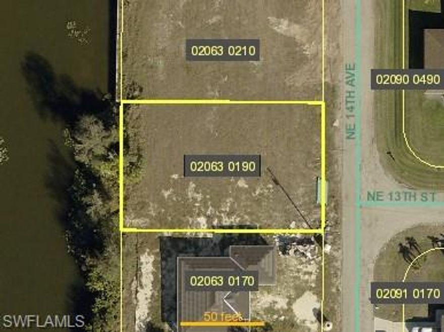 LOT ALREADY CONNECTED TO UTILITIES AND READY TO BUILD!!! 
Welcome to 1300 NE 14th Ave, a waterfront property in the rapidly developing northeast region of Cape Coral, Florida, offers an excellent opportunity for custom home development. Measuring approximately 0.23 acres (10, 001 sq ft), the property features an 80-foot frontage and a depth of 125 feet on a freshwater canal, providing ample space for a spacious single-family home. The area is primed for growth and offers easy access to shopping, dining, schools, and entertainment. Key Features: WATERFRONT!! Location: Situated in Northeast Cape Coral, just minutes from essential amenities, including shopping, dining, schools, and parks. Utilities: The lot is part of the North 1 West 2025 City Utilities Expansion, with city water and sewer services having been already installed.  Zoning: Residential, ideal for building a single-family home. This property is a fantastic investment for homebuilders and developers looking to take advantage of the growth in Cape Coral. Call Now!!!