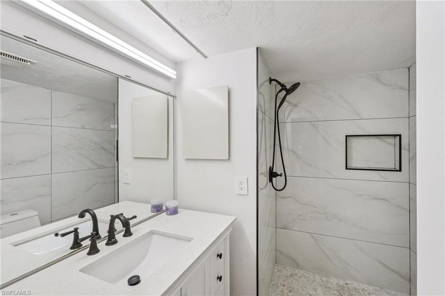 One or more photo(s) has been virtually staged, AI generated or rendered.  Welcome to your Florida retreat, affectionately known as the “Palm Tree Palace.” This seldom-available, top-floor unit (elevator accessible) offers exceptional privacy and serene views overlooking lush golf course fairways and nature preserves.

Added Value: Seller is covering ALL future reserve assessments through the end of 2026, offering a savings of over $14,000, a significant benefit and peace of mind for the next owner.

Interior Features & Upgrades
Efficiently designed with 2 bedrooms and 2 full bathrooms across 919 square feet. This unique unit features a rare double-lanai layout, offering both covered seating and panoramic golf course views from a bright, airy corner position.

Building & Community Amenities
Located in a well-maintained, low-rise, three-story building built in 1981, complete with elevator access. Residents enjoy access to a community pool and tennis courts, perfect for both relaxation and an active lifestyle.

Lifestyle & Location Highlights
Set within a mature, beautifully landscaped community overlooking a golf course and tranquil preserve, this property is ideal for quiet enjoyment or casual entertaining. Centrally located in the heart of 34105, just minutes from shopping, dining, top-rated schools, and Naples’ world-renowned beaches.

Summary
This well-maintained condo offers the perfect blend of relaxed Florida living, added financial value, and prime location. Whether you're searching for a full-time residence, seasonal getaway, or investment opportunity, this is a standout option in a highly desirable area.