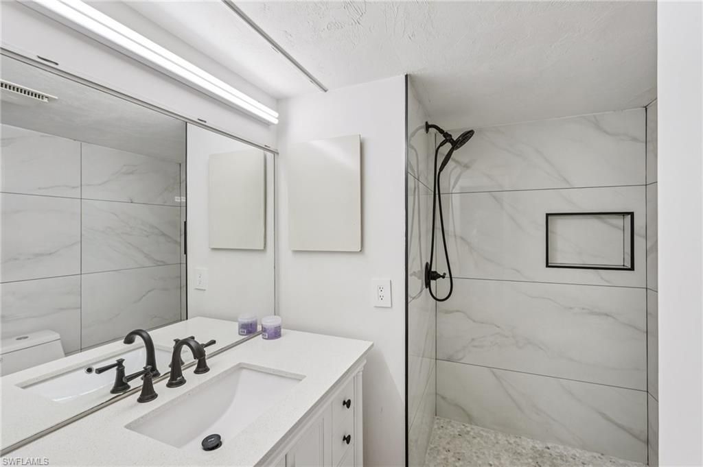 Photo of 499 Forest Lakes BLVD #305, NAPLES, FL 34105 (MLS # 226014174)