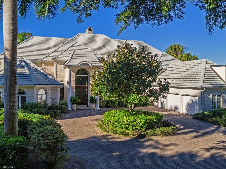 Located behind the gates of exclusive Georgetown in Pelican Bay sits this gracious family home with tremendous potential! Fantastic western exposure with sweeping golf course views.