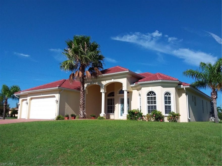 EXPERIENCE the Florida Lifestyle with this MAGNIFICENT Spacious Pool/Spa Home with 3 CAR GARAGE.  Plenty of Outdoor Space for Entertaining as you sip on your glass of wine watching our famous Florida Sunsets. Situated in the Popular SW Cape location, this Meticulously Well-Maintained home is Move-In Ready.  As you walk through the double door entry, this amazing home presents a Living Room with Soaring 15’ Ceilings, Formal Dining Room, Family Room, 3 Bedrooms plus a Den, 2 1/2 Baths which includes an exterior pool bath!  Paver Driveway and Tile Roof.  Upgrades galore, Granite Kitchen Counters, Tray ceilings, Crown Molding, 8 Ft. Doors throughout and so much more.  Close to fine dining, shops & schools.