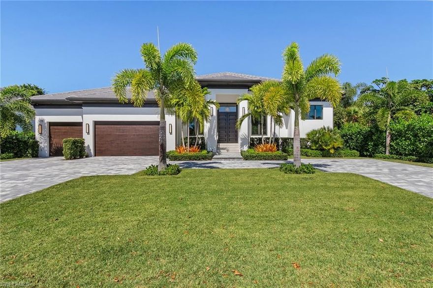 Introducing 625 Parkview Lane - paradise located in the heart of Park Shore. This 3 bed + study, 3.5 bath home completed in 2019 by luxury builder, Borelli Construction of Naples, offers all the amenities for relaxing, entertaining and simply enjoying the Naples lifestyle. The home is situated on a quiet street within close proximity to the private Park Shore beach. The exterior features clean lines and all impact windows and doors while the inside is warm and inviting. Legno Bastone French white oak floors, tall ceilings with unique details and attractive trim work throughout. The spacious kitchen has high-end appliances, Taj Mahal quartzite countertops, oversized island with space for seating and custom European cabinetry with the pantry conveniently tucked in the corner. The great room has a custom built-in to enclose the TV and a wet bar with wine fridge. The owner's suite boasts a sun-filled bathroom with dual sinks and makeup vanity, separate closets with custom built-ins and convenient access to the spa. The outdoor living space features distinct areas for enjoying the weather, a full outdoor kitchen and retractable screens.