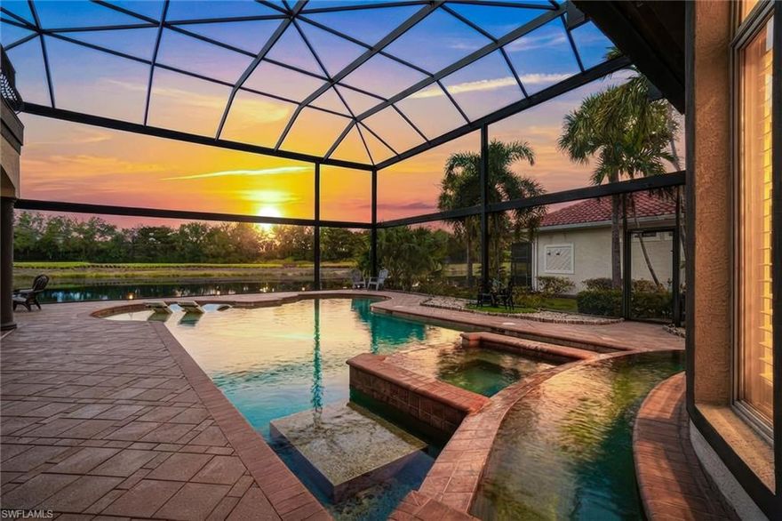 Set on a prime west-facing homesite within the gates of Renaissance, this property captures sweeping lake and golf course views with front-row seats to Southwest Florida’s signature sunsets. This estate blends timeless architecture with livable luxury. Outdoor living is where this property truly shines. A two-story screen enclosure with an oversized picture lanai screen frames the showstopping views, while the covered lanai offers a full outdoor kitchen, multiple seating areas, and a resort-style pool and spa—creating a private retreat that feels both refined and relaxed. A dramatic entry introduces soaring ceilings and a grand staircase, while expansive windows and pocket sliders frame the water and lush fairway beyond—bringing in natural light and creating a seamless connection between indoor and outdoor living. The kitchen is designed to anchor the property, featuring quality stainless appliances, custom cabinetry, granite countertops, a large center island, and walk in pantry. It flows effortlessly into the great room with a showstopping fireplace and into the main living areas, making it equally suited for entertaining or everyday comfort. A built-in office nook and wet bar with beverage cooler add thoughtful functionality. The primary suite is privately positioned and generously scaled offering walk-in closets with built in cabinetry, and a spa-style bath with dual vanities, soaking tub, and walk-in shower. Four additional bedrooms plus a versatile media loft provide flexibility for guests, family, or work-from-home living. Three full baths and two half baths ensure both comfort and convenience throughout. The recently updated 2022 roof adds peace of mind, and the oversized two-car garage provides additional storage. Living in Renaissance means access to an Arthur Hills championship golf course, resort-style pool and pavilion, full-service spa and fitness center, tennis, pickleball, bocce, and an active clubhouse lifestyle—all just minutes from Daniels Parkway conveniences, RSW, and the area’s white-sand beaches. This property offers space, presence, and one of the most desirable sunset exposures in the community—a refined estate opportunity in one of Fort Myers’ premier golf neighborhoods.