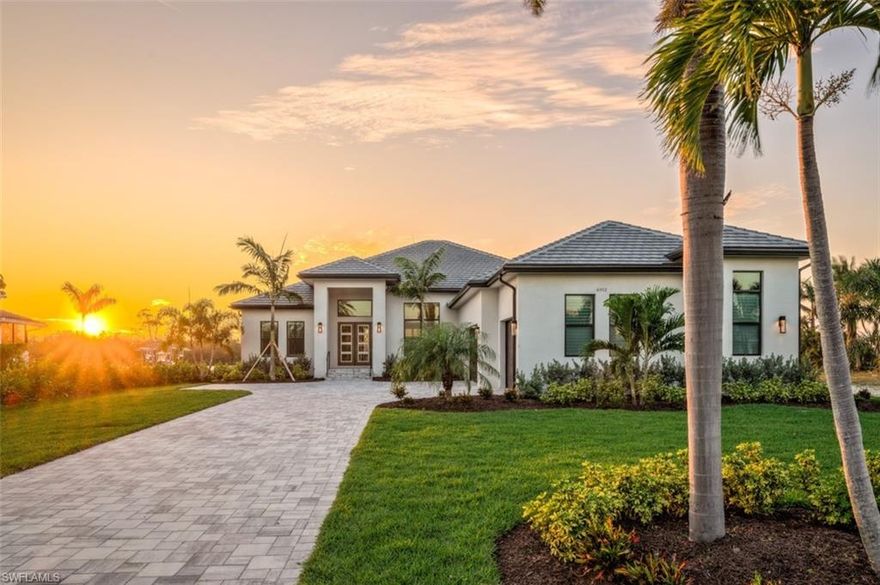 NEW CONSTRUCTION by PGI! This gorgeous, waterfront 3,713 sqft under air home in Town and River Estates has just received it certificate of occupancy! The home features exquisite interior finishes, 4 bedrooms + den 4 1/2 bathrooms, a/c ready 3 car garage, chef’s kitchen, extensive pool complex w/spa & outdoor kitchen, 1,000 gallon propane tank and is full house generator ready. The stunning kitchen includes ample storage, walk-in pantry & top of the line JennAir appliance package, gorgeous quartz countertops, and accent lighting. The spectacular great room showcases breathtaking pool views & the entire home features an extensive AV package. Residence is finished with a large yard with pool/boat storage on the south side of the house and third garage was designed to accommodate a lift.  Plans for a future boat dock are available and the process has been started. Turnkey furnishings are available.