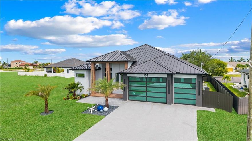 Elevate your lifestyle in this brand-new, ultra-luxury estate at 105 SW 33rd Place, perfectly positioned in the prestigious SW Cape Coral. This 4-bedroom, 3-bathroom masterpiece spans nearly 2,400 sq ft of impeccably designed living space, where every detail exudes sophistication and modern elegance.

Step into soaring ceilings, oversized 48x48 imported porcelain tiles, and 10’ impact glass sliders that bathe the home in natural light. The chef’s kitchen is a work of art, featuring Talmaha quartz countertops, bespoke cabinetry with smart lighting, high-end Italian appliances, and a built-in coffee station. The primary suite offers a private sanctuary with a hidden entry, LED-lit custom walk-in closet, spa-inspired bath with designer finishes, and direct access to your poolside oasis.

Outdoors, indulge in a 14x28 pool with in-ground spa, floating steps, ambient LED lighting, built-in outdoor kitchen, and lush tropical landscaping—perfect for entertaining or serene relaxation. Additional features include a 3-car garage, smart home technology, and the peace of mind that all assessments are fully paid.

Rarely does a property combine unmatched luxury, turnkey readiness, and an exceptional location near boating, shopping, dining, and top schools. Schedule your private showing today and experience Cape Coral living at its absolute finest.