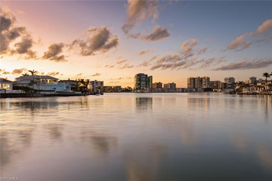 Panoramic bay views define this spectacular Moorings homesite, which can accommodate an approximate 5,800 sq. ft. single-story residence or a much larger two-story residence. Enjoy expansive west-facing water views by day or welcome the glistening evening views as you watch the famed Naples sunsets from your backyard. With 105 ft. of water frontage, the possibilities for this homesite are endless. Moorings residents enjoy private beach access at the Moorings Beach Park and are a short distance to Venetian Village, Waterside Shops, and the upcoming Naples Beach Club, a Four Seasons Resort.