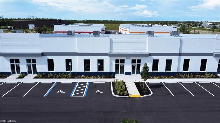 ITEC Flex Space - This 2,765 square foot unit offers Personal or business air conditioned flex space development located 1.7 mile east of I-75 on Alico Rd. Featuring fully air-conditioned space, fire alarm, suppression systems, glass front entrance, overhead LED lights, one 14' high x 12’ wide electric roll up door, ADA bathrooms, Energy-efficient overhead LED lighting, Epoxy flooring. 20' high ceiling and 30' wide. The 2025 CAM = $4.04 PSF