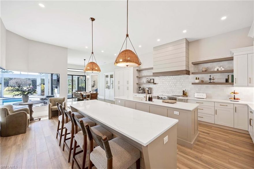 Welcome to 13023 Valewood Drive, a stunning masterpiece located in the highly sought-after Quail Creek community in Naples. This elegant 5-bedroom+den, 4-bathroom home has been completely reimagined with a 2024 remodel, showcasing high-end finishes and exquisite attention to detail throughout.

Step inside to discover a bright and open floor plan with soaring ceilings and expansive windows that flood the space with natural light. The gourmet kitchen is a chef’s dream, featuring premium appliances, custom cabinetry, and two oversized islands perfect for entertaining. The primary suite is a true retreat, offering a spa-like bathroom with a soaking tub, dual vanities, and a spacious walk-in closet. The property also had all new spray foam insulation, all new impact windows and doors, all installed mid 2024.

The outdoor area is an entertainer's paradise, complete with a newly retiled & resurfaced pool and spa, a covered lanai, and plenty of space to enjoy the Florida lifestyle. Situated on a generous lot with lush landscaping, the property offers both privacy and breathtaking views.

Quail Creek is an exclusive community known for its world-class amenities, including two 18-hole championship golf courses, tennis courts, fitness facilities, and a vibrant social calendar. Conveniently located near top-rated schools, fine dining, and upscale shopping, this home offers the perfect blend of luxury and lifestyle.