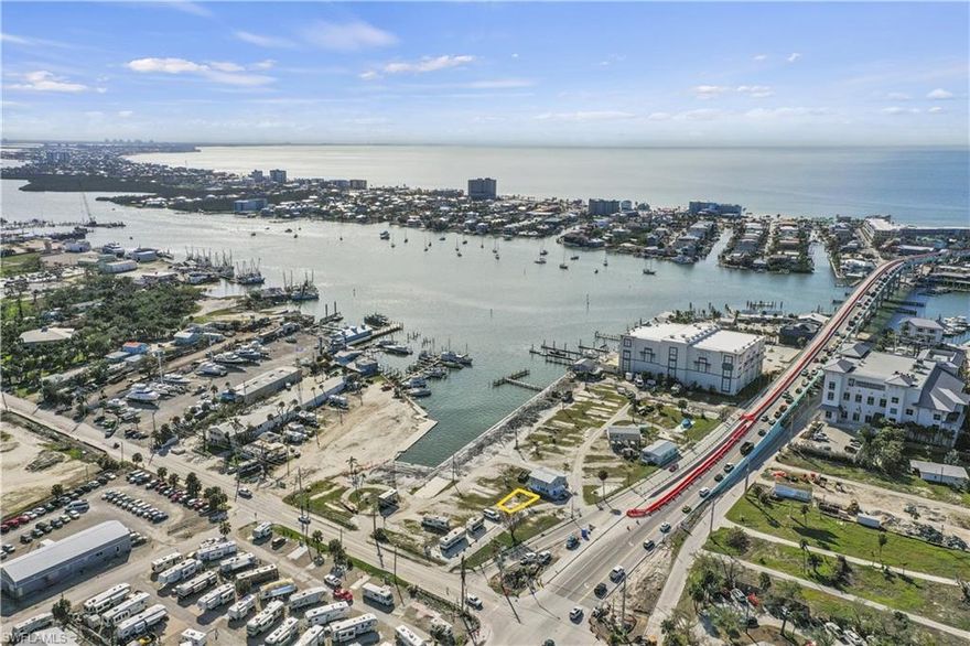 SELLER FINANCING AVAILABLE, BRING ALL OFFERS! Location, location, location! Fort Myers Beach is just a SHORT WALK over the bridge. The is lot is located in Gulf Cove, a 55+, waterfront, co-op community with GULF ACCESS. When you purchase in Gulf Cove, you own 1/60th of the community. The Board of Directors is working on a process for the boat slip assignments. Low HOA fees, only $800/quarter! Sewer, water, and electric for the community has been completed. Highway ready RVs allowed on the lot. New homes must be built to FEMA standards 8-10 feet above ground. Water, sewer, and electric available. Discover your new piece of paradise today!