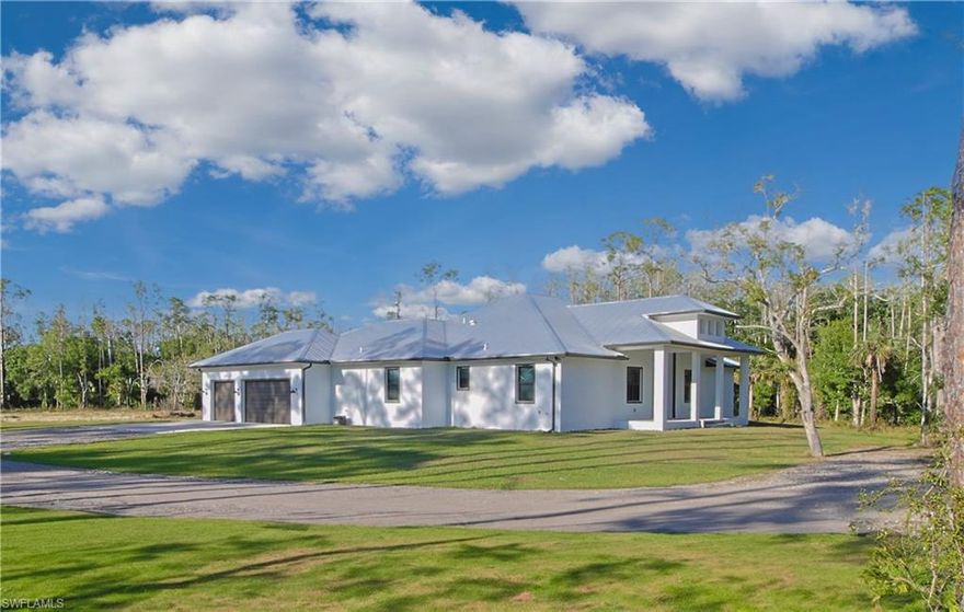 If you're a horse lover searching for the perfect property that offers both luxury and equestrian-friendly amenities, then look no further than this highly sought-after 10.8+ acre property in the Oaks of Alva. This rarely available neighborhood is the epitome of upscale riverfront living, with large acreage properties and a serene atmosphere, yet it's just minutes away from the convenience of I-75. This recently constructed 2023 concrete block home offers 3 bedrooms, a den, 3.5 bathrooms and an attached 3-car garage. Appreciate energy-efficient living with spray foam attic insulation, a 50-year metal roof, and impact-resistant Low-E windows. Step inside and be captivated by the home's grandeur, featuring soaring 10-15 foot ceilings and 8-foot doors throughout. The expansive kitchen island anchors the kitchen and great room, creating an ideal space for entertaining. Relax and unwind on either the spacious 48'x12' rear lanai or the welcoming 32'x8' front porch, perfect for enjoying your morning coffee or an evening beverage. Enjoy peace of mind with this property located outside high-risk flood zones, eliminating the need for flood insurance. The expansive grounds include two ponds and a large 60x40 pole barn, perfect for storing vehicles and recreational equipment. Nestled on a paved road in tranquil Alva, known for its luxurious riverfront estates and some of the largest acreage properties in the county. Embrace outdoor adventures with a short walk or horseback ride to the 1,175-acre Alva Scrub Preserve, featuring hiking, equestrian, and bicycle trails managed by the Lee County Conservation 20/20 program. Plus, access to the Caloosahatchee River and nearby public boat ramps make it ideal for boating and fishing enthusiasts.   PID 32-43-27-00-00001.00B0